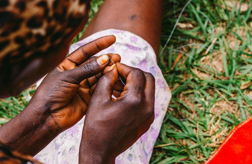 closeup of Beatrice making jewelry