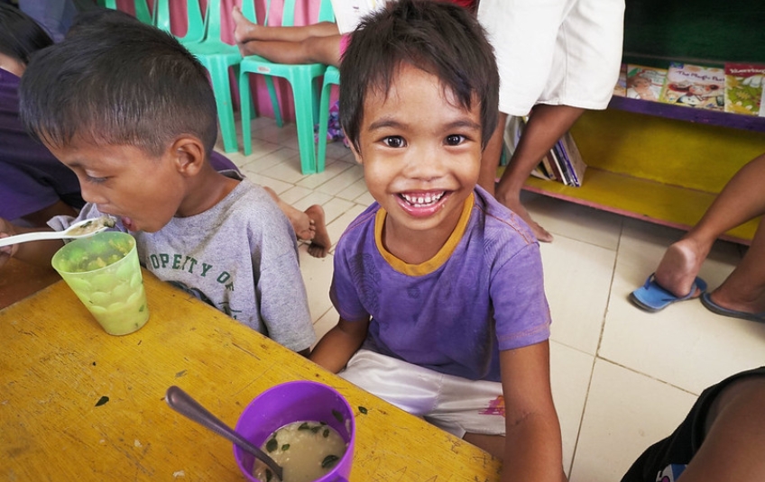 child eating FMSC food