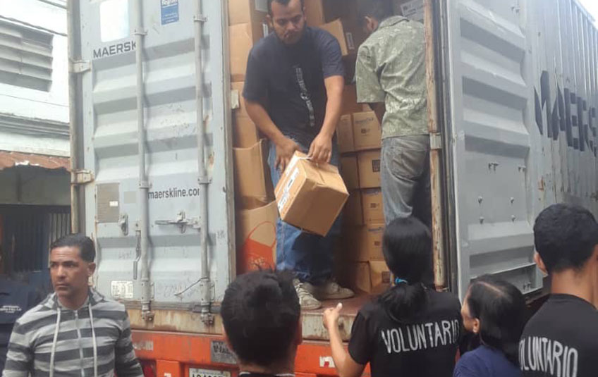 FMSC food boxes being unloaded from a truck