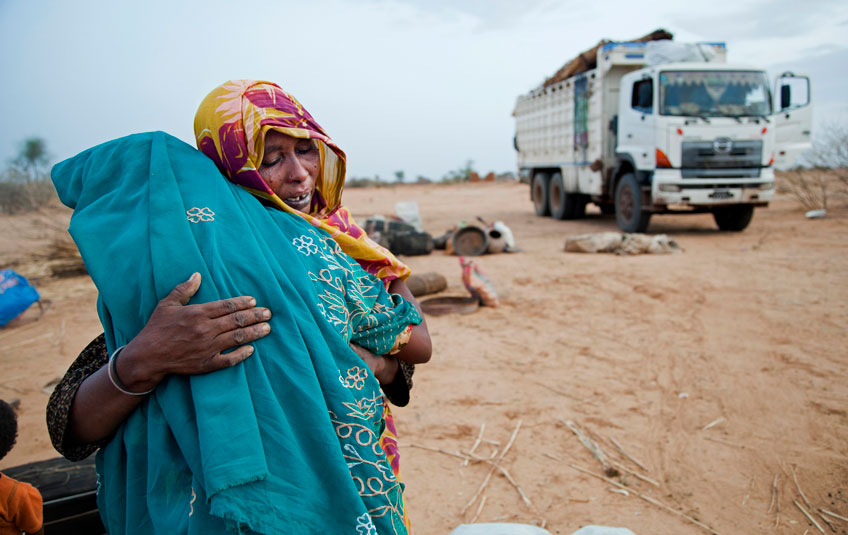 two women embracing. Photo credit Stuart Price