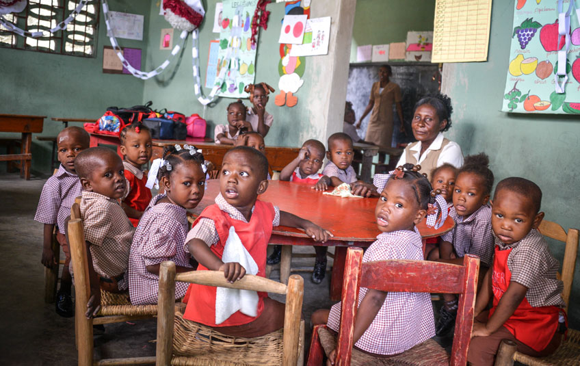 children sitting around a table