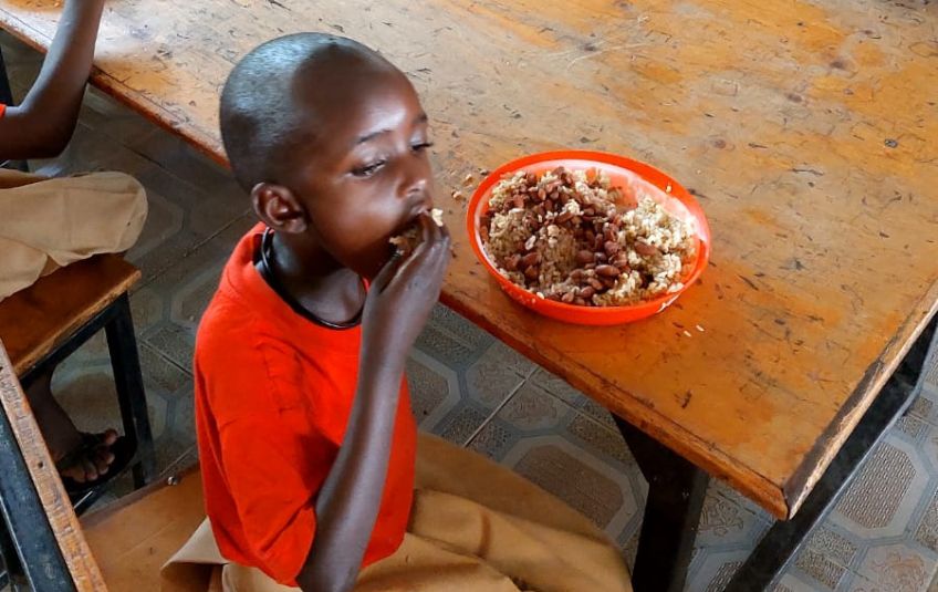 Amina eating at school. 