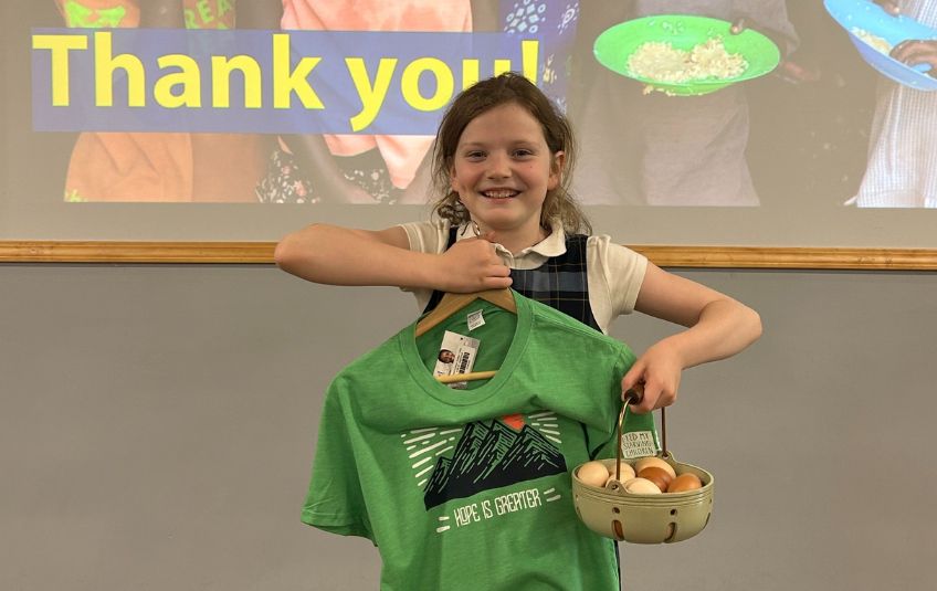 How one girl and her chickens fundraised to feed a child for a year