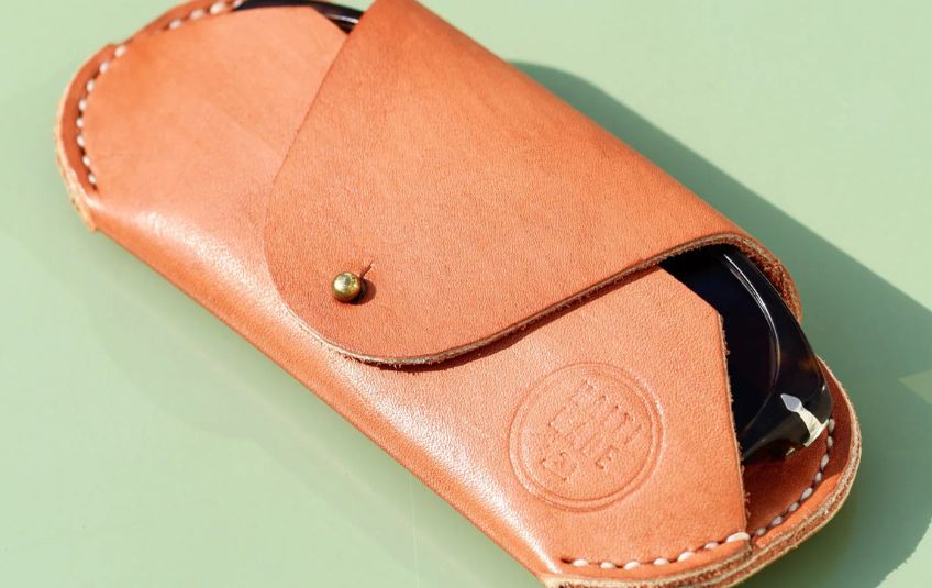 FMSC MarketPlace solay sunglasses sleeve in cognac. 