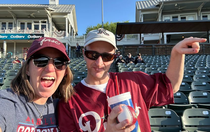FMSC Richardson site manager Larissa with super volunteer Tyler at a Frisco RoughRiders game.