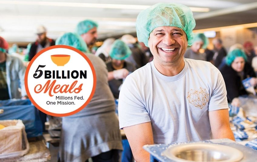 5 billion meals man smiling in hairnet