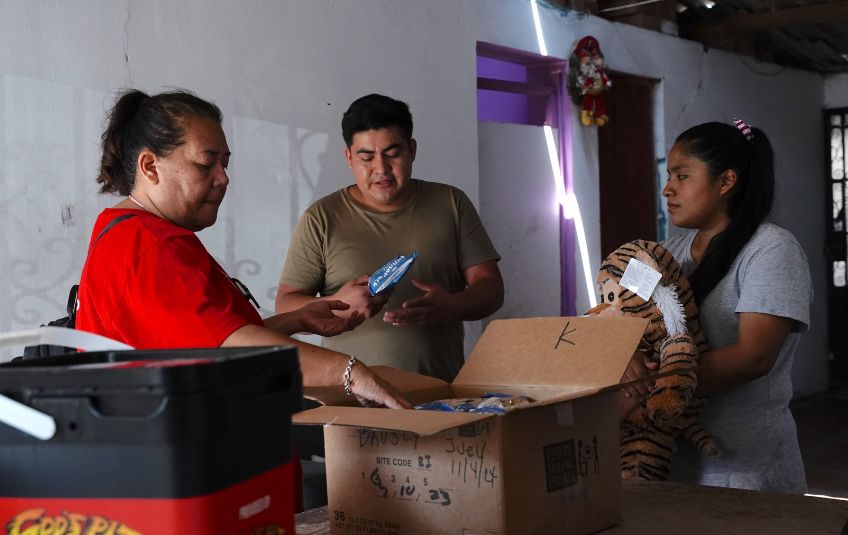 Bruno opening his box of MannaPack rice.